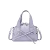 Bolso tipo cartuchera retro para mujer Primavera 2026 Nuevo Estilo Coreano de Moda Bolso de axila de nicho Bolso de hombro de gran capacidad
