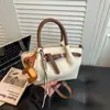 Popular Bolso de Mano Estilo Coreano para Mujer de Comercio Exterior 2026 Nuevo Bolso de Hombro Estético de Nicho Bolso Cruzado Tipo Cubo de Alto Valor