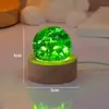 Atacado transfronteiriço de bolas de cristal coloridas com rachaduras de gelo, bolas de cristal com céu estrelado brilhante, luzes noturnas, ornamentos decorativos de mesa e luzes de ambiente