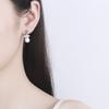 Nuevos pendientes de perlas con borlas de corona para mujer, escalera coreana, cuadrado, pequeña fragancia, personalidad, tendencia, una generación de venta al por mayor