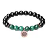 Pulsera de Cuentas de Ónix Negro y Malaquita con Dijes de Loto Diseño Ajustable y Elegante para Hombres y Mujeres Perfecta para Meditación, Espiritualidad y Accesorio de Moda Diario