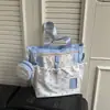 Mochila de estilo universitario nueva 2026, fresca y linda de dibujos animados, gran capacidad, ligera, adecuada para clases de tutoría, fácil de llevar, bolso de hombro para estudiante