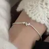 Pulseira Versátil de Corrente Ossinho de Cobra com Coração Simples e Personalizada Ins Nicho Alta Qualidade Pulseiras Empilháveis Primavera e Verão Novo Estilo 2025