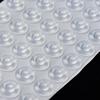Almohadilla autoadhesiva de partículas de silicona anticolisión transparentes de alto patrón para silenciadores de puertas de gabinetes de muebles dedicados transfronterizos