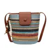 Bolso Cubo de Paja Rayado Arcoíris Nuevo Primavera/Verano 2026 Bolso de Hombro Tejido de Nicho Retro Bolso Cruzado Versátil para Mujer