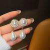 Pendientes de perlas con forma de gota de agua 2023, nuevos y modernos pendientes de celebridades de Internet de Corea del Sur, pendientes populares, sencillos y de alta calidad para mujeres.