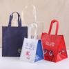 Tela no tejida recubierta impermeable bolsa de embalaje para llevar de catering para té de leche bolsa de mano publicitaria de compras de ropa regalo personalización