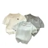 Camisa de punto de estilo preppy de moda con cuello polo, top versátil para el verano, versión coreana, camisa de punto de moda para niños