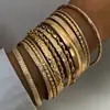 Moda Europea y Americana Nuevo Estilo Moda Personalizada Grabado Trenzado Geométrico Multicapa Apilados Pulseras Set de 10 Piezas Accesorios Al por Mayor
