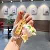 Llavero de Mini Ramo Tejido a Mano "Gracias por Estar Aquí" Colgante con Etiqueta para Regalo del Día del Maestro, Adorno para Bolso para Maestros