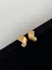 Pendientes Europeos y Americanos de Diseño de Nicho con Metal Cepillado Irregular Retorcido Incrustados con Diamantes Estilo Frío Pendientes de Gama Alta