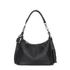 Bolso de hombro transfronterizo de cuero de grano superior para mujer, gran capacidad, cuero suave, bolso cruzado para el día a día, bolso tipo tote casual con borlas, personalizable