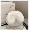 Venta al por mayor bolso de felpa lindo para niña a la moda orejas de conejo casual con clip bolso de mano cadena de moda bolso bandolera