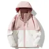 Tmall con el mismo estilo ropa de montaña impermeable a prueba de viento desmontable tres en uno para mujer otoño e invierno abrigo hombre