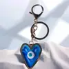Llavero Colgante para Mochila Accesorios Colgantes Ojo del Diablo Color Contrastante Creativo Desenfocado Pegamento de Resina para Llavero Colgante Transfronterizo Nuevo Producto