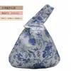 Venta al por mayor del fabricante Empaques de regalo grandes y pequeños Bolsas de regalo de almacenamiento Bolsas de mano con asa única estilo chino para recuerdos