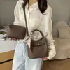 Bolsa Kelly com Grão de Lichia Feminina 2026 Outono/Inverno Nova Bolsa de Ombro Única de Alto Padrão Bolsa Saco Versátil para o Dia a Dia de Alto Padrão