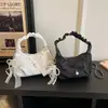 Bolso de Axila de Calidad de Comercio Exterior 2026 Nuevo Lazo Bolso Cruzado de un Solo Hombro para Mujer Moda de Mano Plegado Bolso Dumpling