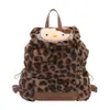 2026 Outono e Inverno Novo Estilo Coreano Peludo Estampa de Leopardo Gatinho Infantil Mochila Bolsa Pai e Filho Estudante Atacado
