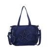 Bolso de mezclilla para mujer de gran capacidad 2025 Nuevo bolso de hombro casual de primavera y verano Bolso tote de clase con estrella de cinco puntas