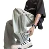 Pantalones Rectos con Tres Franjas y Empalme Lateral para Hombre y Mujer Nuevo Estudiante Casual Pantalones Deportivos Celebridad de Internet Nueva Tendencia