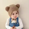 Corea del Sur ins sombrero de bebé lindo super lindo celebridad de Internet orejas de oso otoño e invierno bebé masculino y femenino jersey lana orejeras sombrero