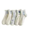 Calcetines para Mujer en Otoño e Invierno Estilo Nuevo Caricatura Cara Sonriente Calcetines de Algodón de Media Pantorrilla para Mujer Son Cómodos, Absorbentes del Sudor, Transpirables y Versátiles para Estilo Campus de Niñas