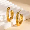 Aretes de acero de titanio del fabricante, aretes grandes de aro de acero inoxidable exagerados, diseño geométrico liso hueco, populares en Europa y América, aretes de nicho