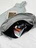 Bolsa de lona de gran capacidad para mujer, nuevo diseño de moda nicho otoño 2026, bolso de hombro y bandolera, bolsa tipo empanada para el día a día