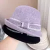 Sombrero de pescador de ala ancha estilo Hepburn para niños, otoño e invierno, sombrero de punto de lana australiana, sombrero de cubo con lazo de color, sombrero de moda versátil