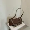 Bolsa de ombro de corrente transfronteiriça para mulheres, bolsa de ombro com design de nicho estilo coreano, bolsa de ombro e transversal vintage de grande capacidade para o dia a dia