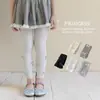 Venta al por mayor transfronteriza leggings nuevos para niñas primavera y otoño 2026 para usar como prenda exterior, pantalones de algodón a rayas verticales para niños con múltiples lazos, longitud recortada