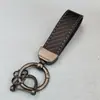 Chaveiro de Carro com Padrão de Fibra de Carbono de Alta Qualidade Transfronteiriço Pingente Criativo Moda Masculina Negócios Corda de Couro Chaveiro Atacado
