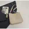 Bolso tipo cubo con estampado de lichi de moda transfronterizo para mujer, nuevo bolso casual elegante para el día a día, bolso de hombro cruzado vintage de gran capacidad