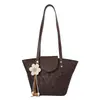 Bolsa de Braço Feminina Simples Personalidade Única Ombro Único Transversal 2026 Nova Pequena Design de Nicho Tendência para o Dia a Dia Bolsa Saco Feminina
