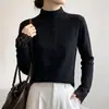 Camisa de nuevo estilo con mangas huecas y cuello semi-alto con artesanía hecha a mano, moderno empalme de encaje, diseño ajustado, suéter de punto para mujer