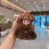 Novo Pingente Chaveiro de Boneca Cartoon de Olhos Grandes, Fofo Laço de Pelúcia Vinil Boneca Charme de Bolsa
