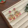 Pendientes de campana navideña de estilo transfronterizo europeo y americano, exquisitos pendientes de lujo ligeros con diseño de nicho con incrustaciones de diamantes y estrellas de colores.