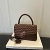 Bolso nuevo para mujer, bandolera simple retro moderno elegante 2026, bolso cruzado de temperamento casual único, bolso cuadrado pequeño