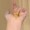 Anillo de Borla de Fénix Estilo Nacional Nuevo Boda China Tres Accesorios Dorados Temperamento Clásico Sensación de Alta Gama Anillo para el Dedo Mujeres