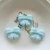 Accesorios de resina lindos de dibujos animados abeja mariposa flor DIY hechos a mano para clip de pelo de niños colgante de bolsa materiales