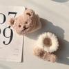 Invierno Nuevo lindo oso de dibujos animados anillo a presión Pulsera de juguete de peluche para niños Suministros decorativos creativos