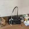 Bolsa baguette de poá com design de nicho para comércio exterior para mulheres, novo modelo 2026, bolsa de ombro versátil de alta qualidade, bolsa pequena quadrada de mão