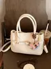 Bolso de Mano de Moda Nueva con Patrón de Lichi para Mujer, Bolso Cubo de Nicho Estilo Coreano, Bolso Versátil de Hombro y Cruzado