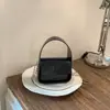 Bolsa Pequena Quadrada Feminina Cor Sólida Texturizada Moda Verão 2026 Tendência Retro Cor Sólida Feminina Alça de Corrente Transversal Ombro