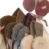 Orejeras de punto estilo coreano retro para mujer, nuevo modelo otoño e invierno 2026, protección para los oídos a prueba de frío, orejeras cálidas con cordones