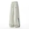 Calça Jogger Casual Solta da Marca da Moda para Homens, Estilo Primavera com Listras Coloridas nas Laterais, Punhos Ajustáveis, Calça Esportiva