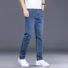 Hong Kong 2026 Primavera Nuevos Jeans Rectos Ajustados para Hombre Estilo Coreano Modernos Elásticos de Alta Gama Casual Pantalones Largos para Primavera y Otoño