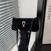 Fivela de Fecho de Nicho Estilo Coreano Bolsa Baguete Elegante de Ombro 2026 Nova Moda Versátil Simples Bolsa de Ombro de Mão