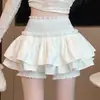 Falda elástica negra para mujer, nueva colección primavera/verano 2026, corte A, ajustada y acampanada, adecuada para figuras petite